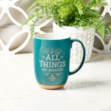 Green Clay Base Exposed Ceramic Coffee Mug with Green Plant in Background