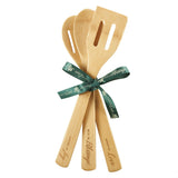 Three-Piece Bamboo Utensil Set of spoon with imprinted words of MIX IN BLESSINGS, slotted spoon with imprinted words of SCOOP UP LOVE, and slotted spatula with imprinted words of SERVE UP JOY in the set.   Tied with attractive green ribbon.