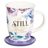 Floral Purple Lidded Ceramic Mug - Front View with Psalm 46:10 Bible Verse Inscription and Lid Utilized as Coaster for Mug