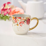 "Beauty From Ashes" Red and Orange Marigold Ceramic Tea Cup with Floral Background and White Ceramic Teapot