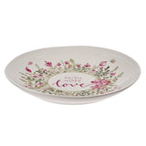 White Ceramic Plate with Pink Floral Design - Side View