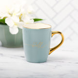 It Is Well With My Soul Soft Blue and Gold Ceramic Coffee Mug with White Flower in Background