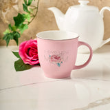 Pink "I Love You Mom" Ceramic Mug with Deep Rose and White Tea Pot in Background