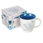 White Ceramic Cup with Blue Floral Design