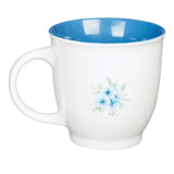 White Ceramic Cup with Blue Floral Design