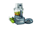 Gorgeous, blue-green modern 13-cup food processor filled with colorful food and shown with sliced open kiwi fruit to the side.