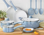 12-Piece Light Blue & White Cookware Set consisting of two sauce pans and one Dutch oven with lids. Also, two skillets and one mini-omelet pan, along with a nylon slotted spatula, nylon slotted spoon, and solid nylon spoon.