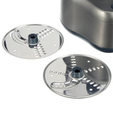 Close-up picture of two round cutting blade discs for the Cuisinart Elemental 8-Cup Food Processor.