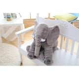 Gray Soft Plush Elephant Stuffed Doll Toy on White Bench